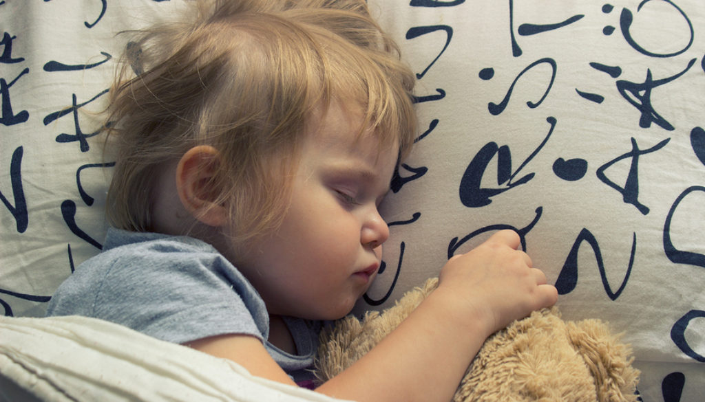 Sweet dreams- toddler sleeping with teddy bear