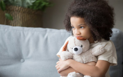 GIRL HUGGING BEAR